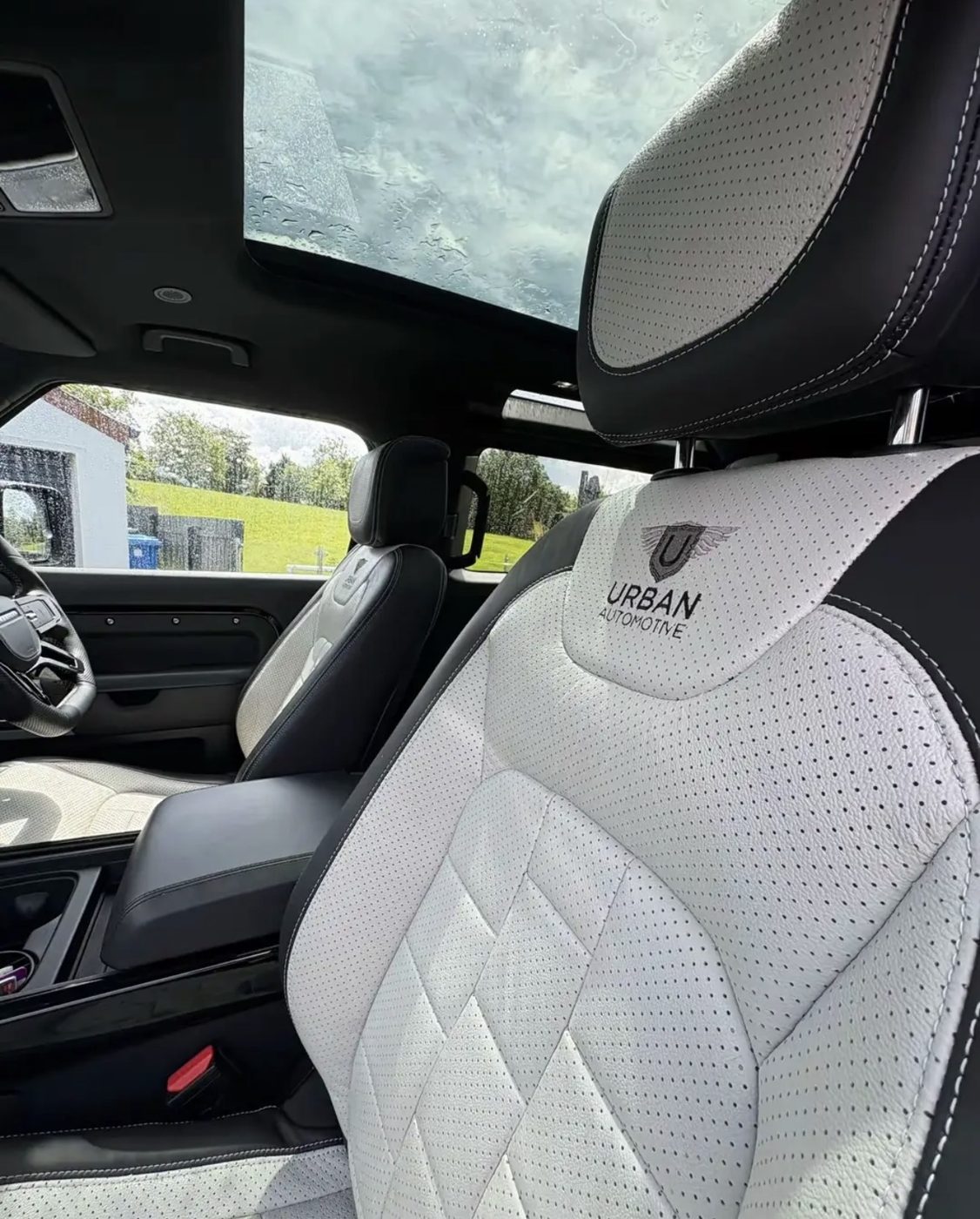 Spotless white leather seats after an interior clean
